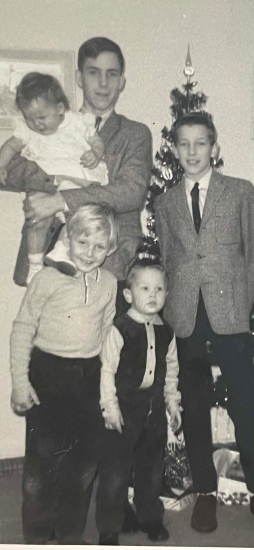 Christmas around 1961 — Bobby, 15, with his brother Doug, 10, and cousins Gary and Mike, Uncle Gordie's boys